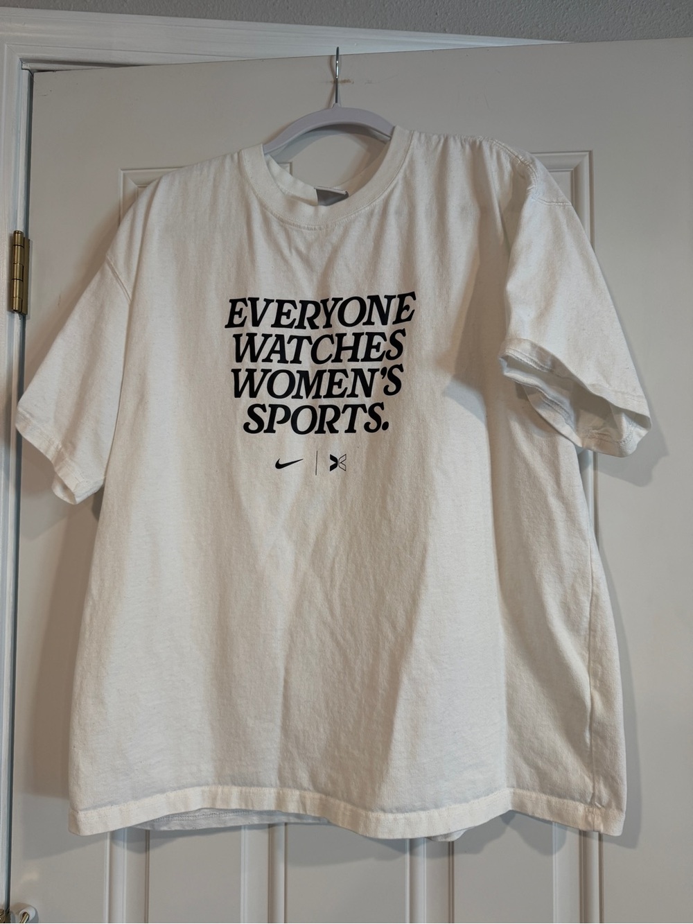 Nike White Short-Sleeve Graphic Tee with Black Text